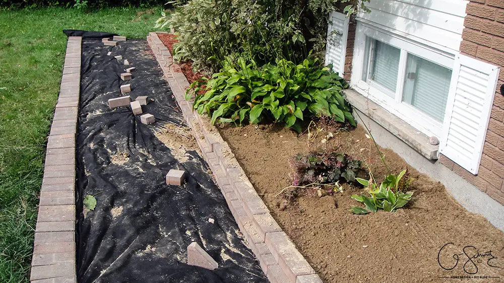 Can you believe this area was just grass and a chain link fence before? Here is the story of how we finished our side yard landscaping :)