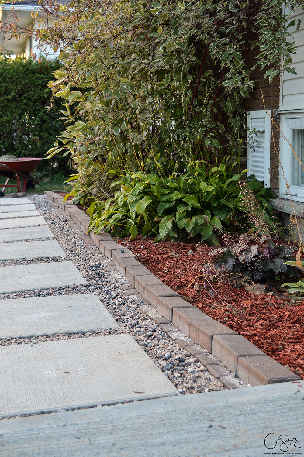 Can you believe this area was just grass and a chain link fence before? Here is the story of how we finished our side yard landscaping :)