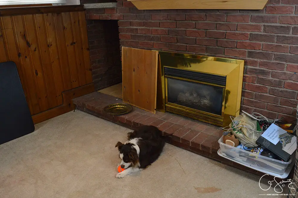 My basement is definitely "country". Think plaid and dark wood paneling, and that pretty much describes this space. You know what style I am not? Country! But, let's look at pictures of the basement anyways, along with my lovely little comments of issues I would change...