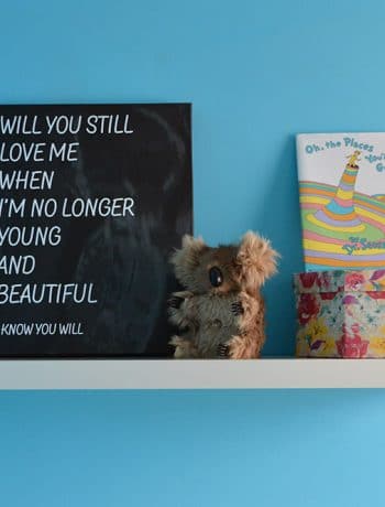 I designed this custom graphic canvas using the image from my baby’s ultrasound and some song lyrics. It is the perfect addition to our minimalist nursery.