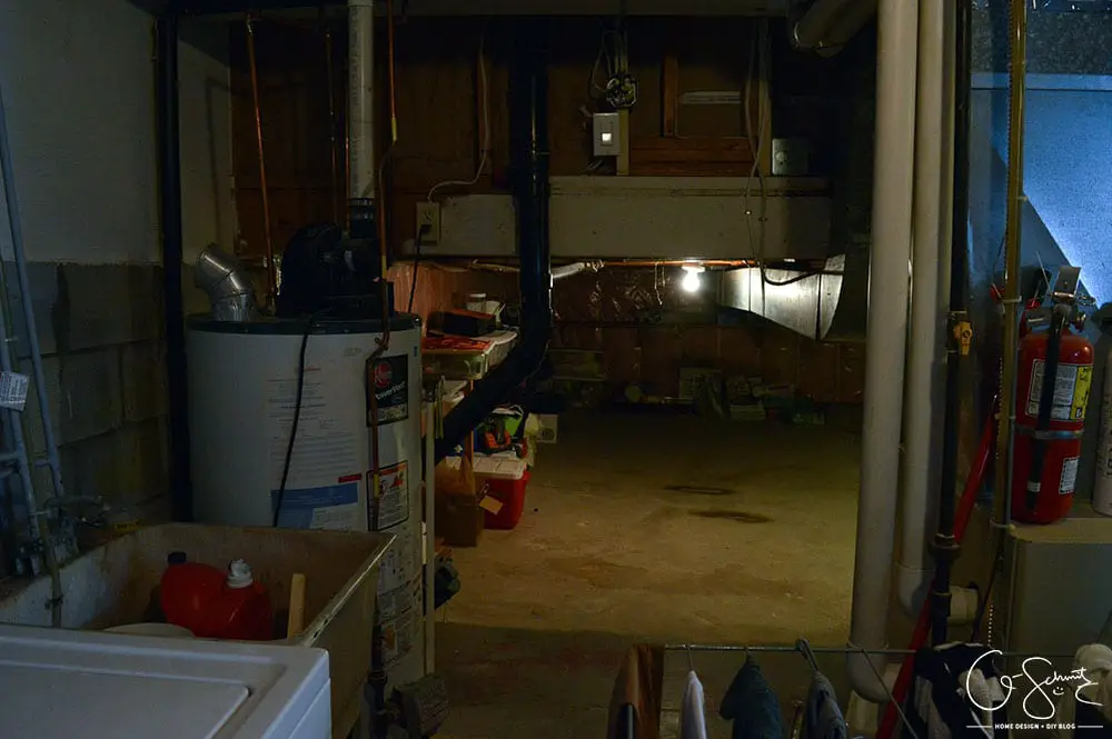 Our unfinished laundry room is dark, dingy, cobweb-y and rough... but every place needs a starting point - at least it's functional :)