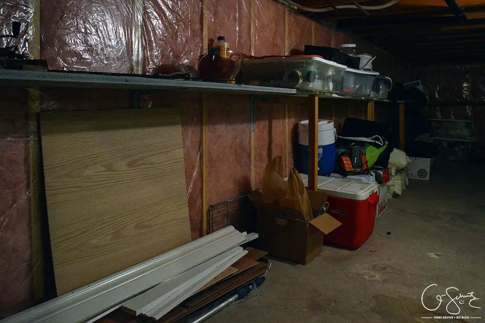 Our unfinished laundry room is dark, dingy, cobweb-y and rough... but every place needs a starting point - at least it's functional :)