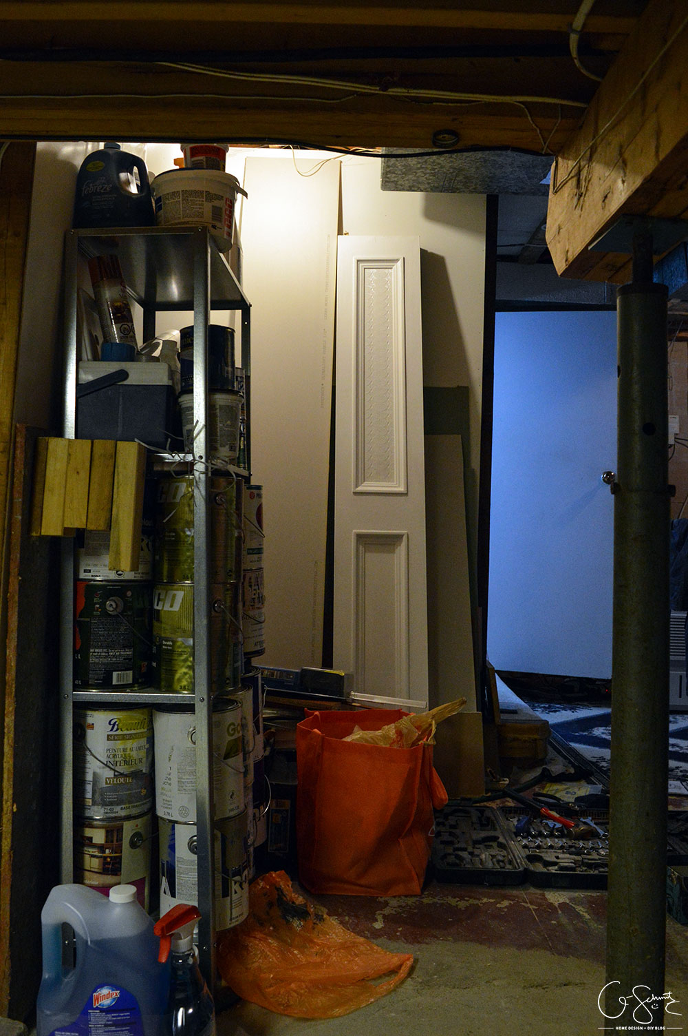 Our unfinished laundry room is dark, dingy, cobweb-y and rough... but every place needs a starting point - at least it's functional :)