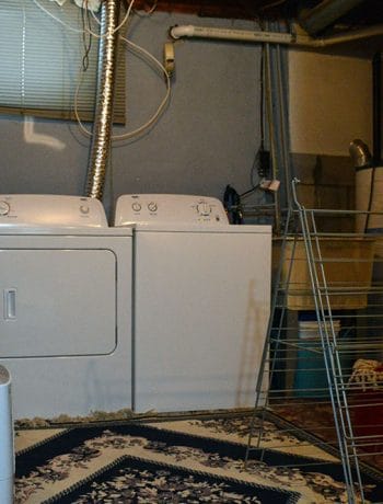 Our unfinished laundry room is dark, dingy, cobweb-y and rough... but every place needs a starting point - at least it's functional :)