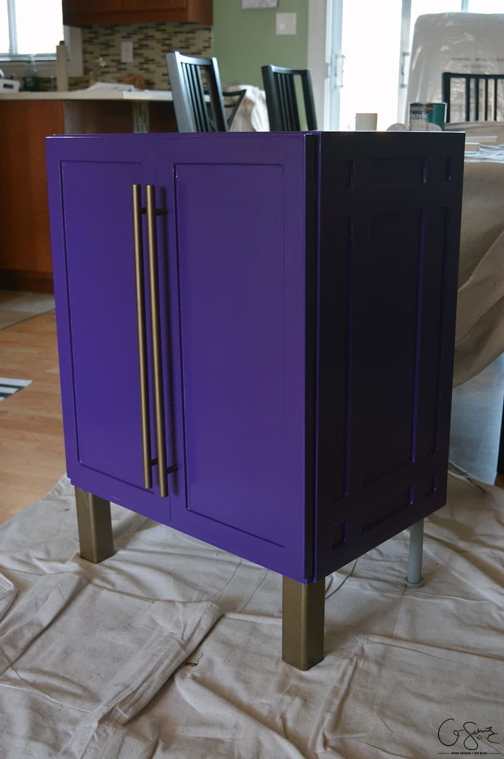 For our basement half-bathroom addition, I created a custom Ikea vanity using the Ikea Fullen sink cabinet. And it's bright purple!