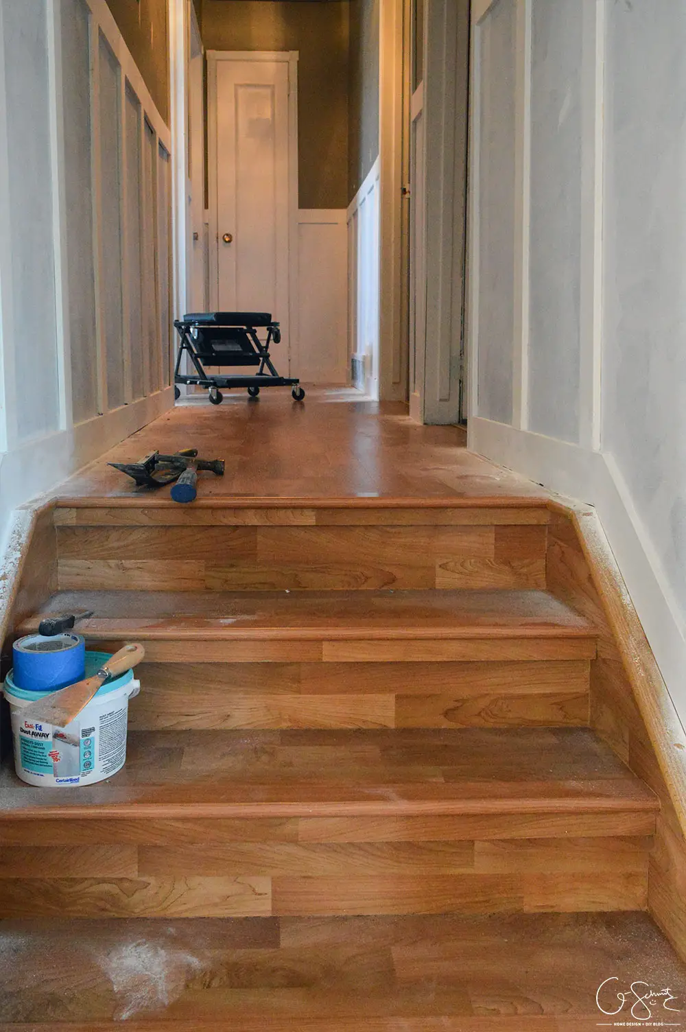 Do you have any millwork in your house? There are so many different styles, and almost no limits to what can be achieved with a few coats of paint and some pieces of trim! Here's an overview of how I was able to add board and batten style millwork to our hallway.