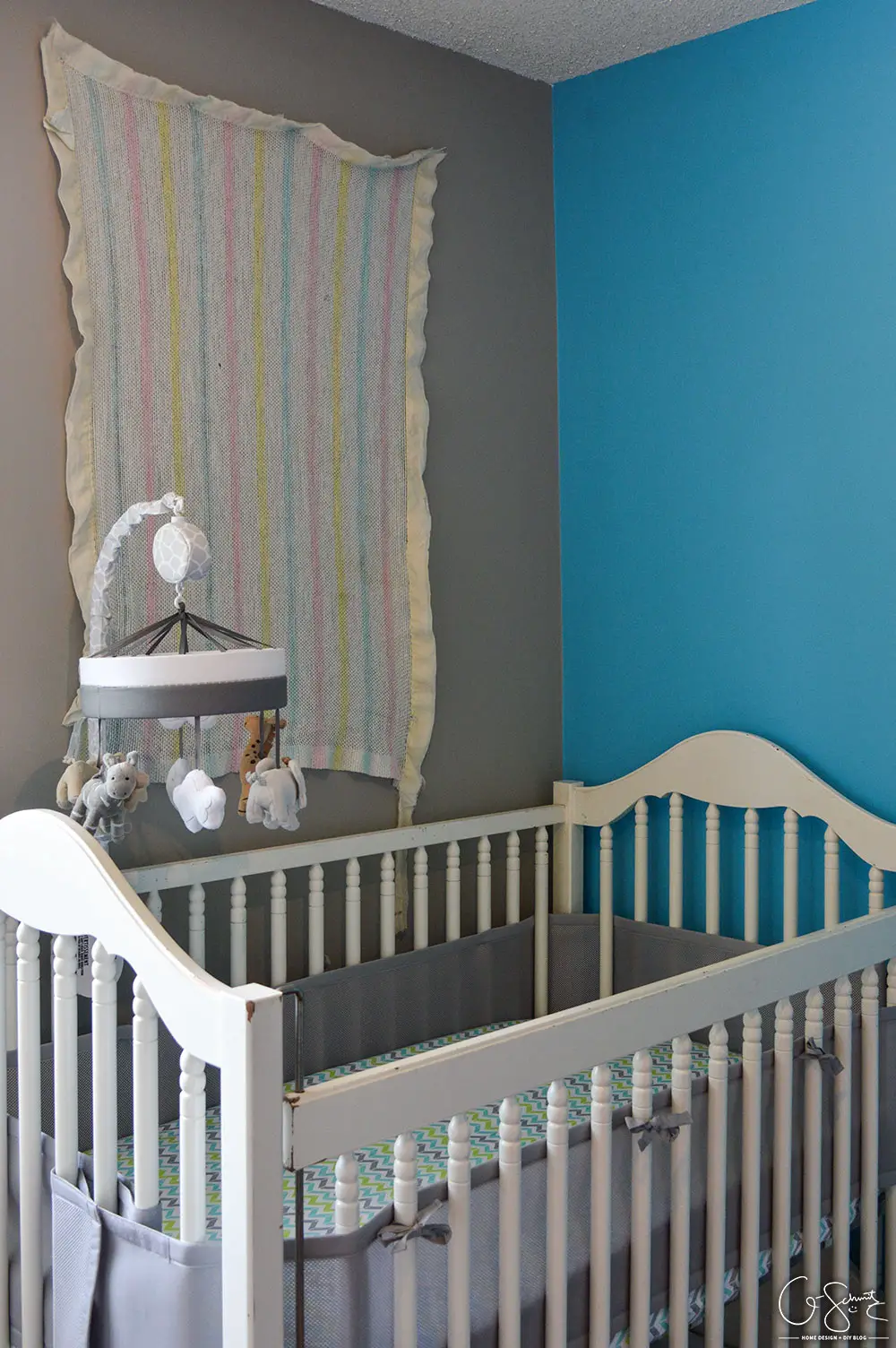 I finished our neutral nursery, and I’ve got all the essentials (crib, rocking chair, change table)… but would you mind helping decide if we need a rug?