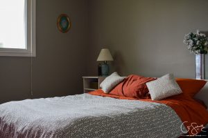 what was once an office is now a simple guest bedroom (with a surprising accent wall in pink!). I like to call it a simple guest bedroom, because really - all there is to it is a bed, nightstand, and your basic necessities. No cool theme, no rhyme or reason to how it is decorated... just a little place for guests to come spend the night.