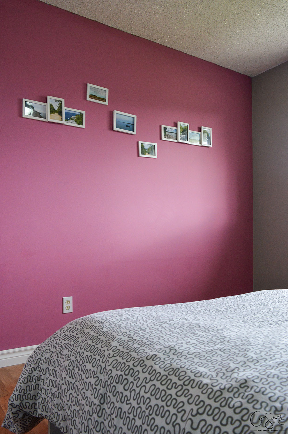 What was once an office is now a simple guest bedroom (with a surprising accent wall in pink!). I like to call it a simple guest bedroom, because really - all there is to it is a bed, nightstand, and your basic necessities. No cool theme, no rhyme or reason to how it is decorated... just a little place for guests to come spend the night.