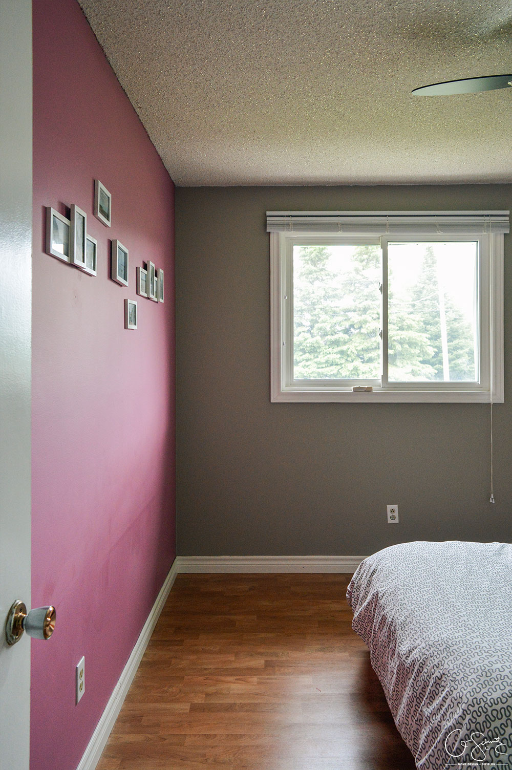 What was once an office is now a simple guest bedroom (with a surprising accent wall in pink!). I like to call it a simple guest bedroom, because really - all there is to it is a bed, nightstand, and your basic necessities. No cool theme, no rhyme or reason to how it is decorated... just a little place for guests to come spend the night.