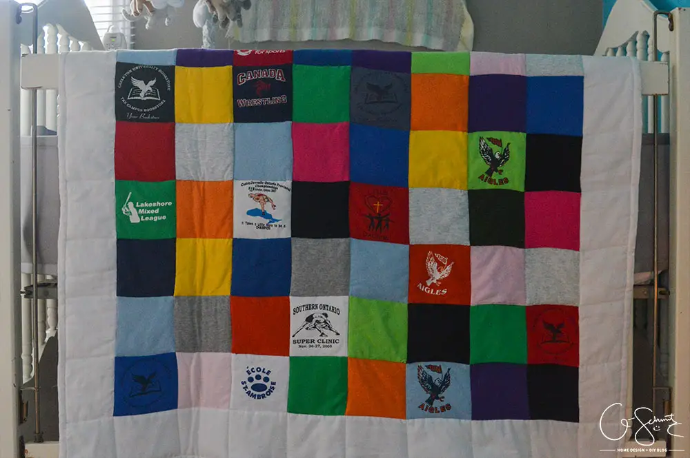 If you're someone like me that's held on to some old t-shirts and wanted to put them to good use, then you can certainly use this idea! Check out how I was able to repurpose years’ worth of (mostly) free clothing to create a custom t-shirt baby quilt.