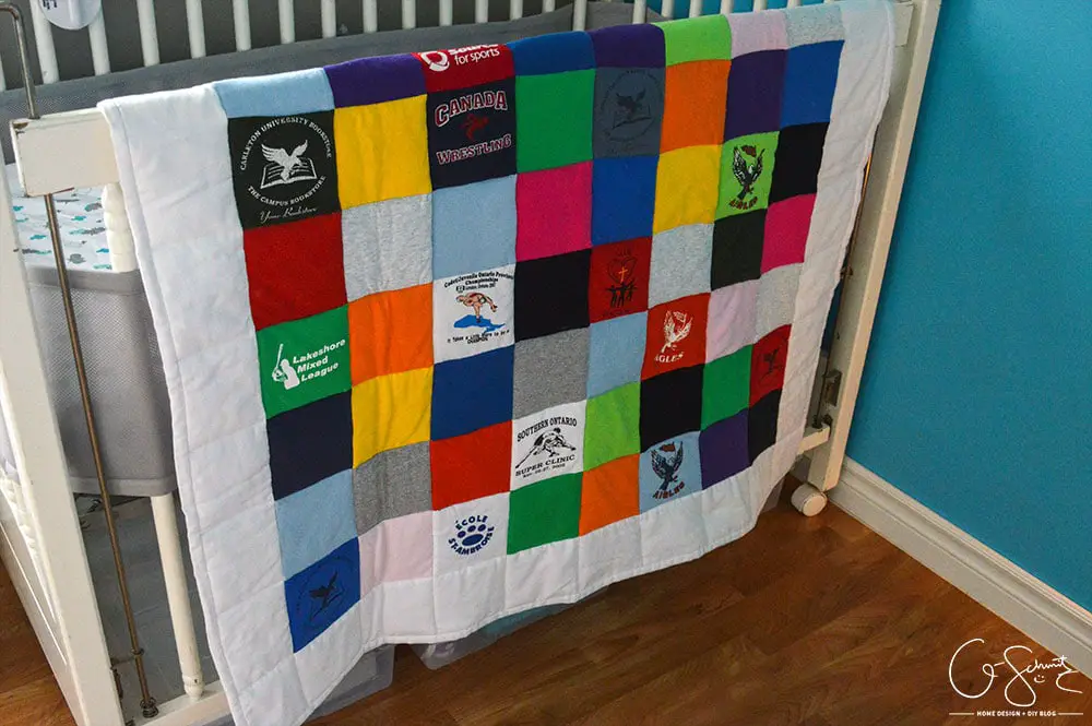 If you're someone like me that's held on to some old t-shirts and wanted to put them to good use, then you can certainly use this idea! Check out how I was able to repurpose years’ worth of (mostly) free clothing to create a custom t-shirt baby quilt.