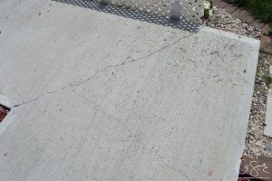 We had poured our concrete late last summer / early fall and I was really worried that it would crack. It did :( Here's the super easy lowdown on how to seal a crack in concrete!