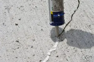 We had poured our concrete late last summer / early fall and I was really worried that it would crack. It did :( Here's the super easy lowdown on how to seal a crack in concrete!