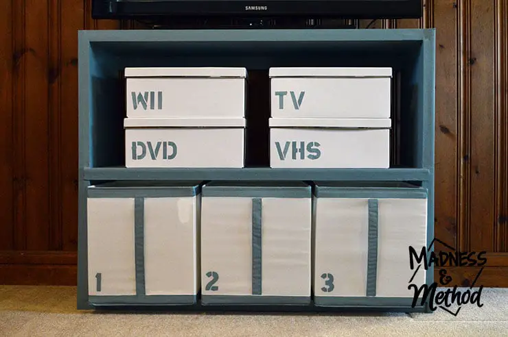 When I started organizing our media centre, I really wanted the new storage solution to both function, and look good. I decided to create custom painted Ikea boxes, and today I'm giving all the details on how I made them.