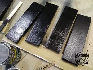 Painting wooden slats black and adding a topcoat