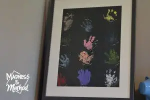 Baby handprint art on a shelf