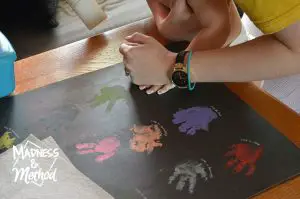 Taking a handprint of a baby