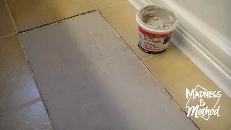 using floorpatch and repairing subfloor to replace cracked tile