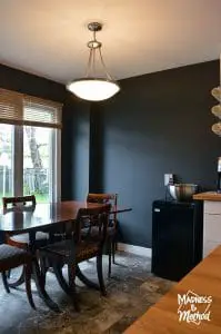 white kitchen and black dining room