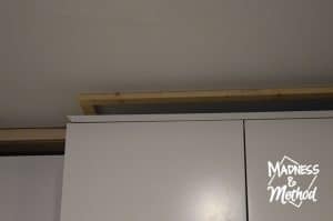 add a backing piece to install trim above cabinets