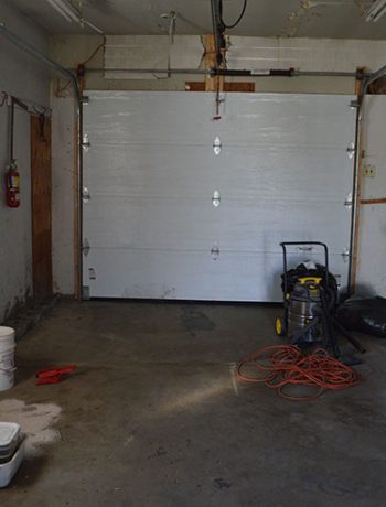 empty garage looking towards door