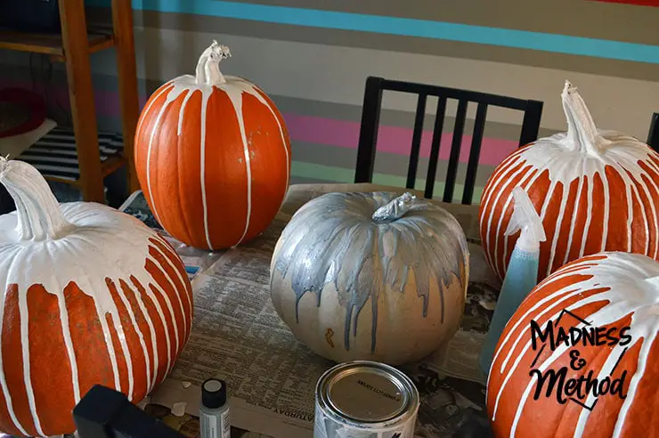 paint-drip pumpkins drying