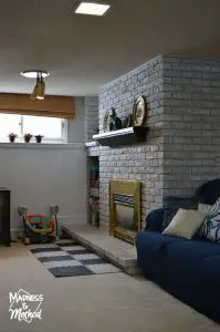 view of fireplace in basement family room