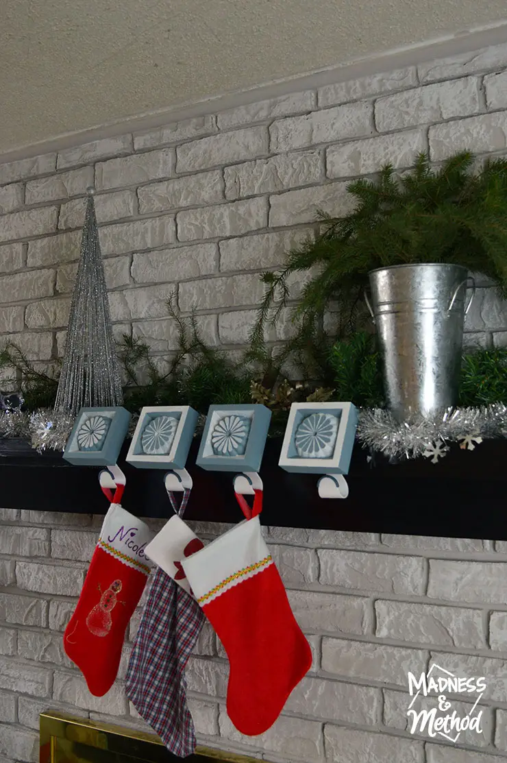 custom stocking hangers on simple mantel