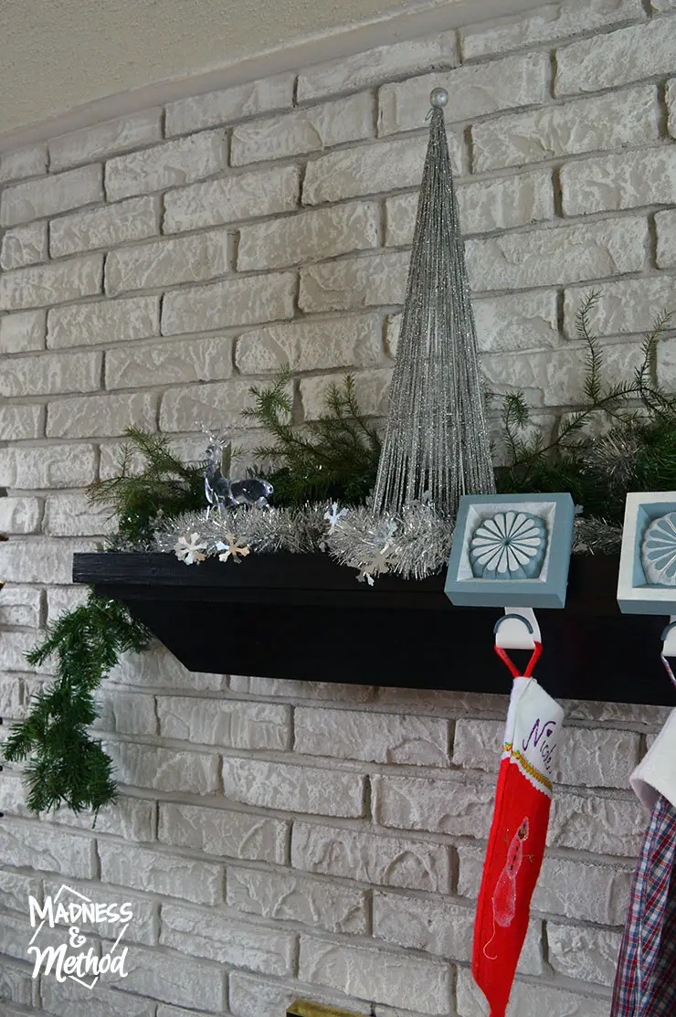 silver and green holiday mantel