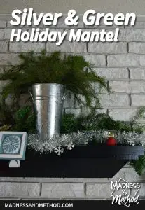 simple silver and green holiday mantel