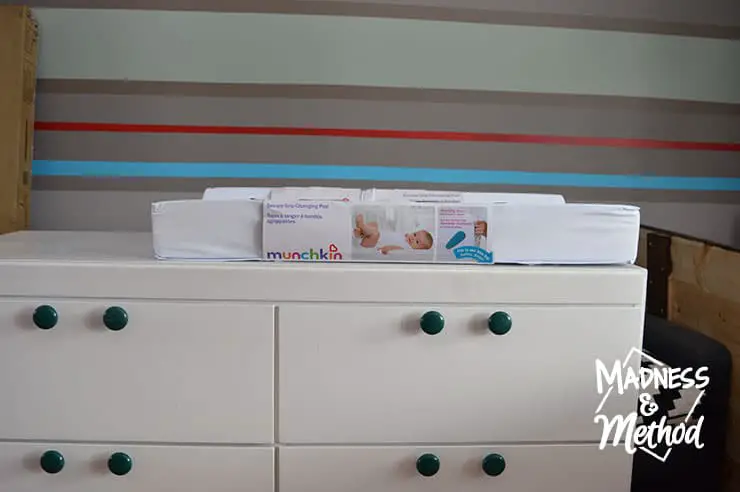 baby change pad on dresser