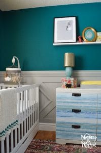 gray wainscoting and white furniture