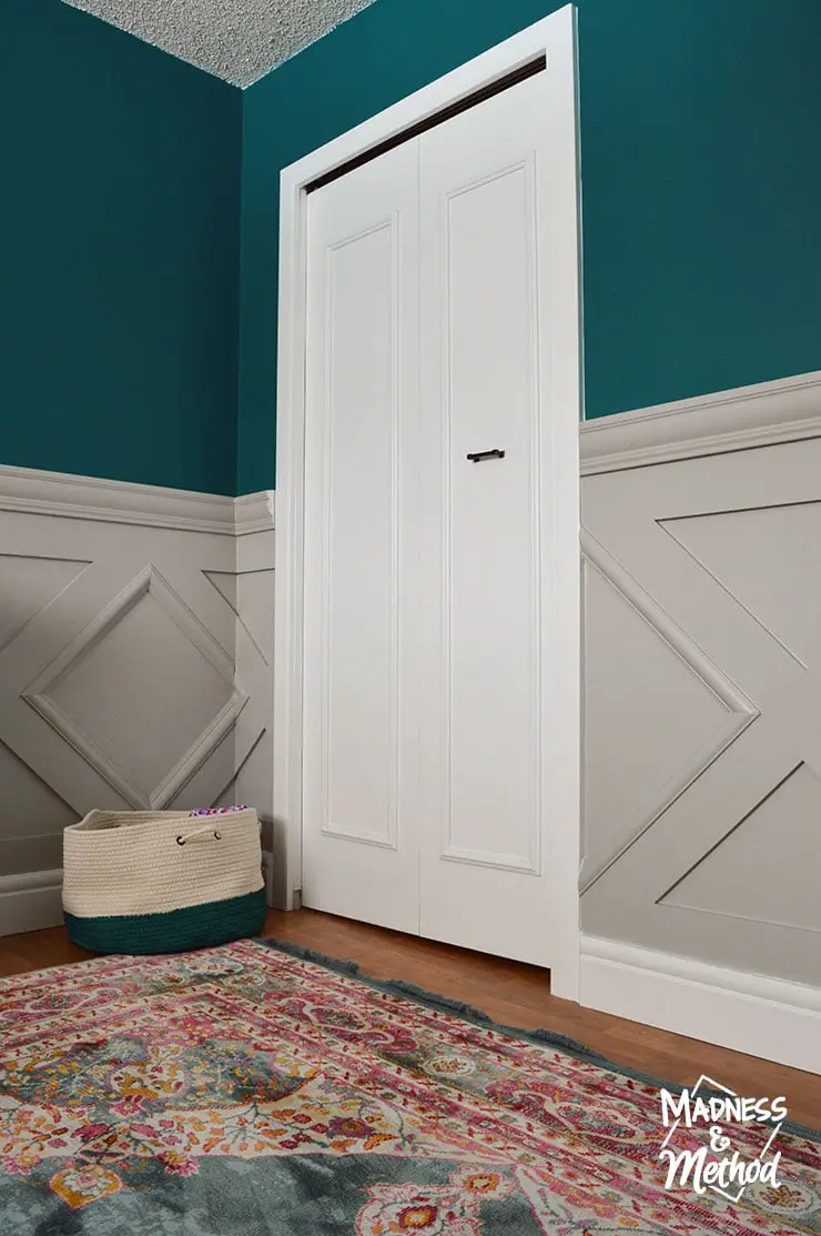 update closet doors in dark teal nursery