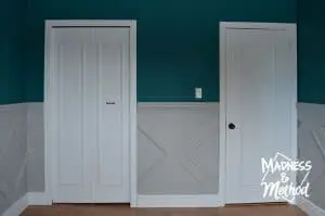 panelled doors with gray wainscoting