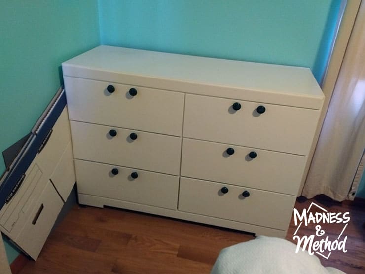 white 6 drawer dresser with green knobs