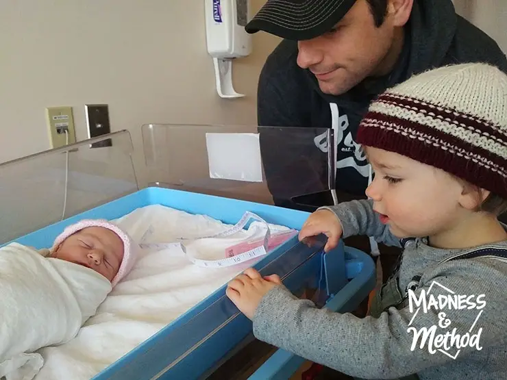 family visiting baby in the hospital