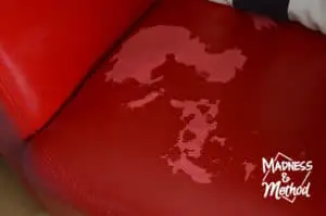 peeling red leather chair