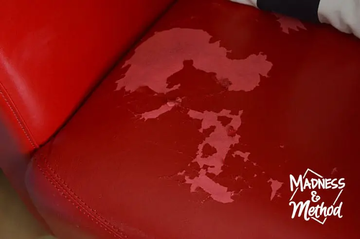 peeling red leather chair 