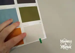 comparing paint swatch to walls