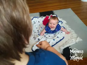 baby on mat and toddler