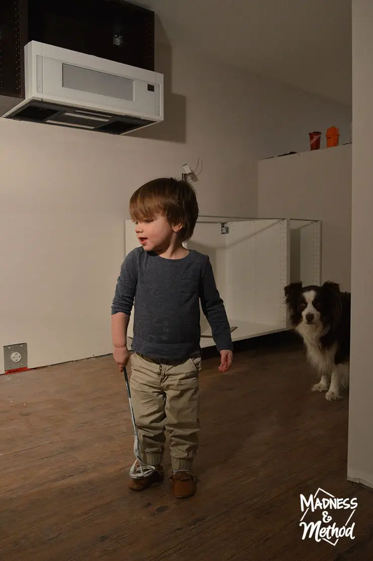 helpers installing ikea cabinets