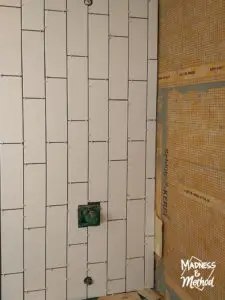starting tile pattern in bathtub
