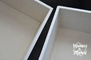 caulking edges of drawers