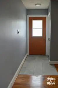 blue gray walls with orange door
