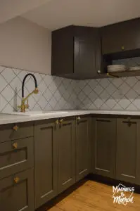 dark brown cabinets and gray counters