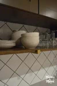 kitchen shelf holding cups