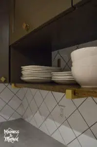 kitchen shelf holding plates