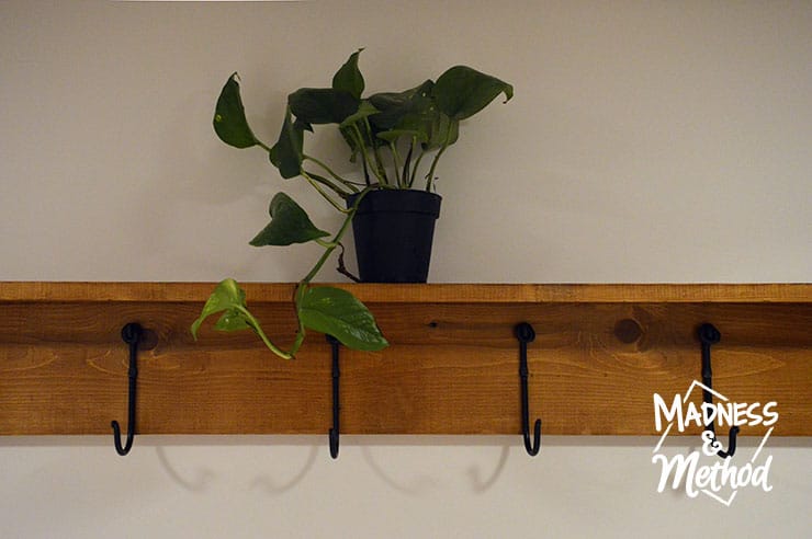 small storage shelf in mudroom