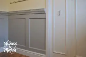 white doors and gray wainscoting